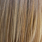 Close-up of Firenze HF synthetic wig in Cake Batter Blonde, showing long, layered, wispy strands.