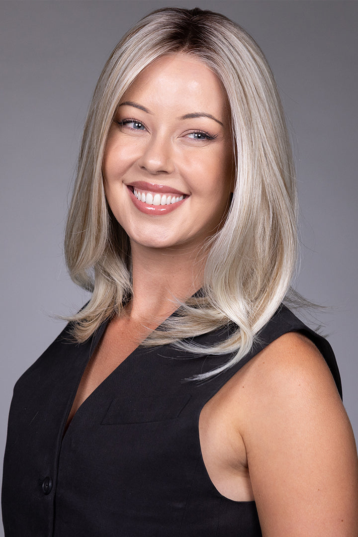 Adriana by Belle Tress layered blonde bob wig with a natural lace front and monofilament top.