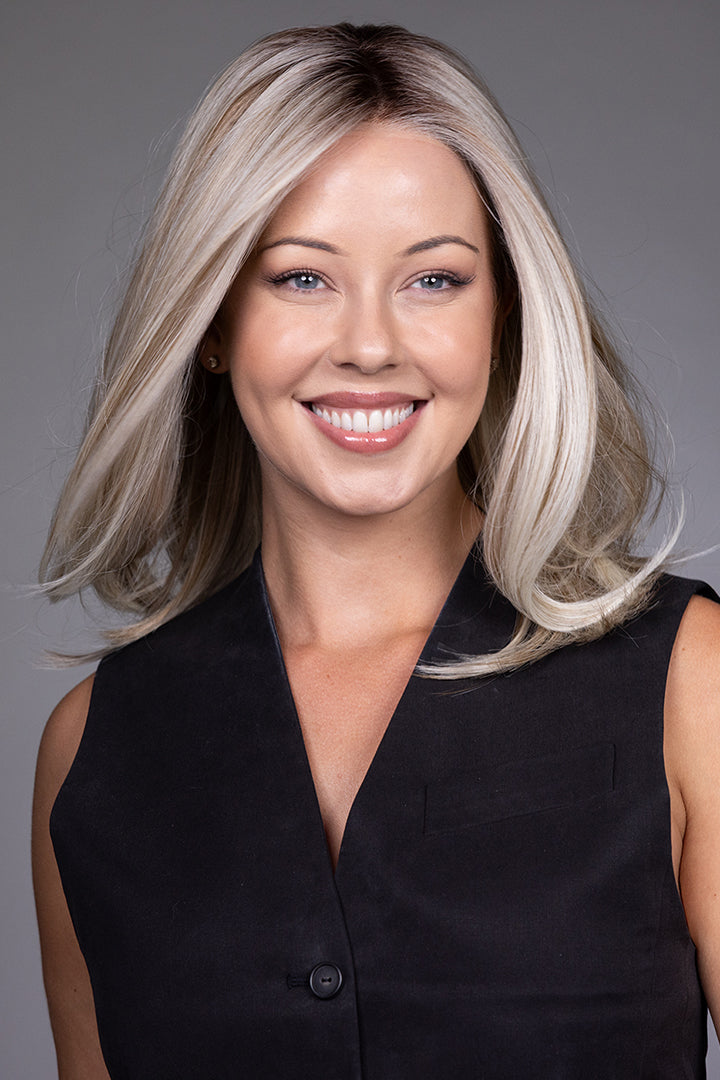 Adriana by Belle Tress layered bob wig in blonde with a natural lace front and monofilament top.