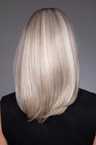 Back view of Adriana by Belle Tress synthetic layered bob wig in a highlighted blonde shade with soft, curved ends.