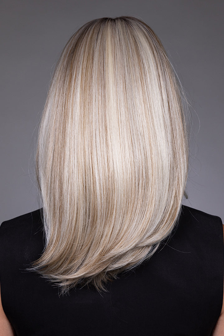 Back view of Adriana by Belle Tress synthetic layered bob wig in a highlighted blonde shade.