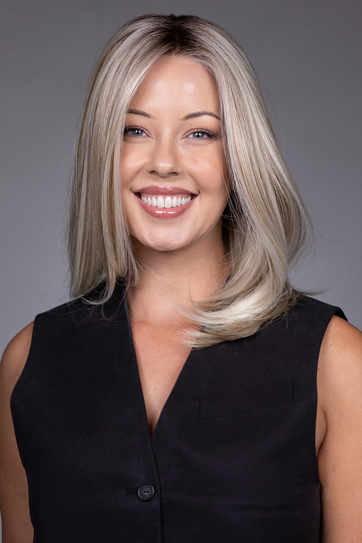 Adriana by Belle Tress layered blonde bob wig with a natural lace front and monofilament top.