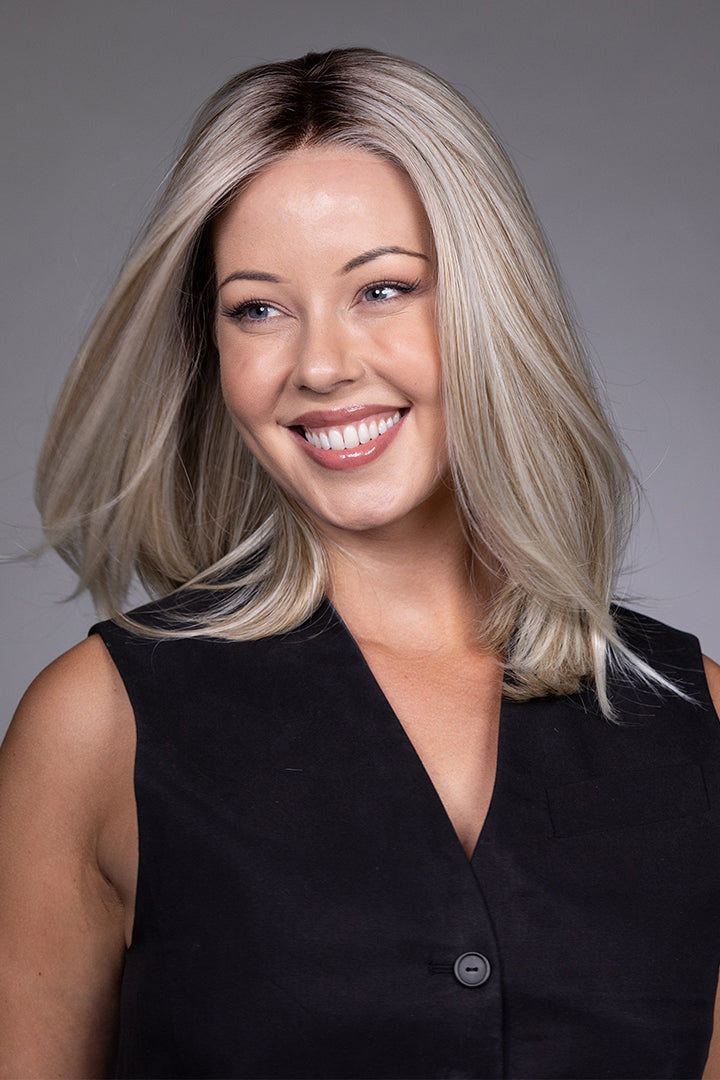Adriana by Belle Tress layered blonde bob wig with a natural lace front and monofilament top.