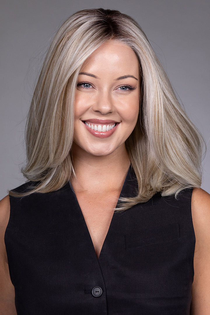 Adriana by Belle Tress layered blonde bob wig with a natural lace front and monofilament top.