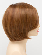 Abbey human hair blend wig by Envy displayed on a mannequin head in side profile against a white background - color Creamed Coffee