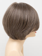 Abbey human hair blend wig by Envy displayed on a mannequin head in side profile against a white background - color Dark Grey