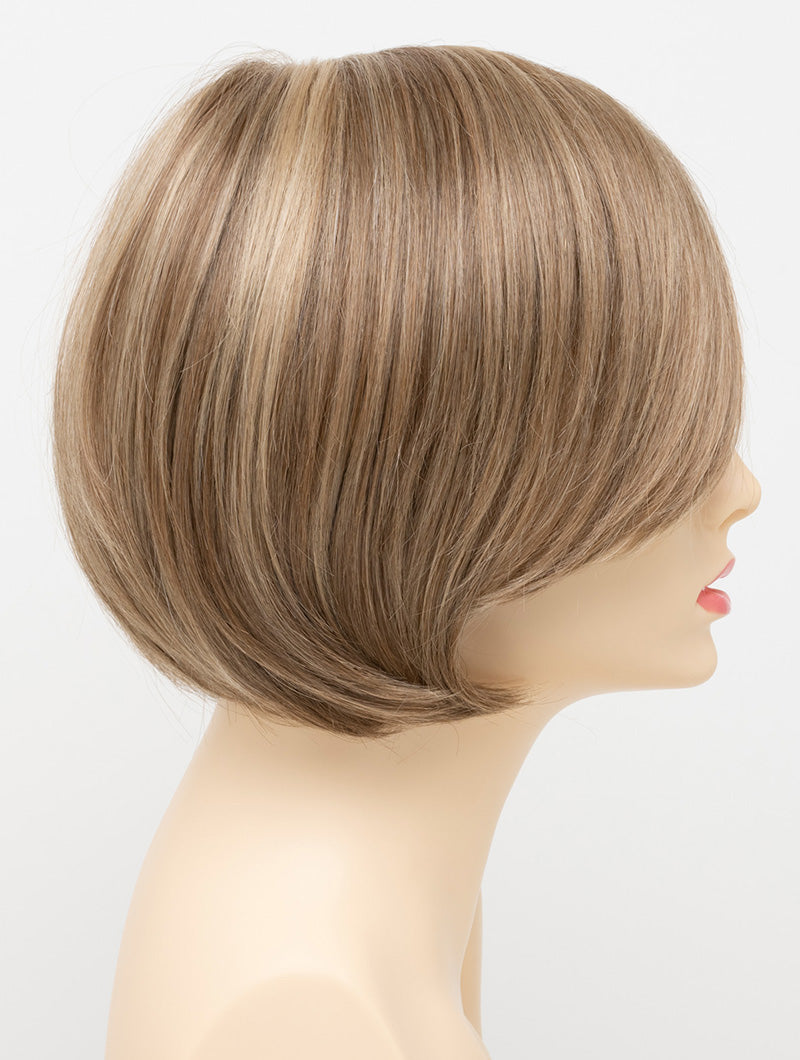 Abbey human hair blend wig by Envy displayed on a mannequin head in side profile against a white background - color Ginger Cream