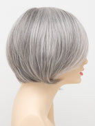 Abbey human hair blend wig by Envy displayed on a mannequin head in side profile against a white background - color Medium Grey