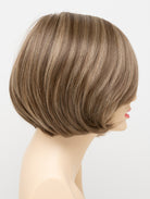 Abbey human hair blend wig by Envy displayed on a mannequin head in side profile against a white background - color Mocha Frost
