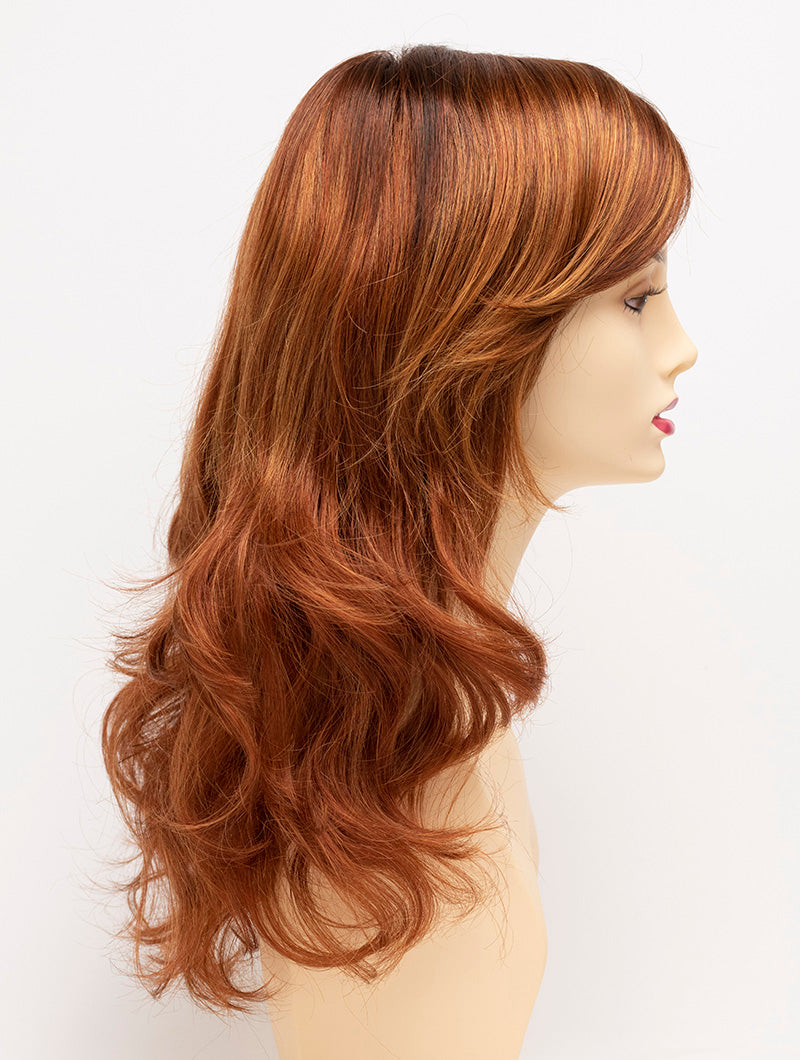 Alana synthetic wig by Envy on a mannequin head against a white background - color Lighter Red