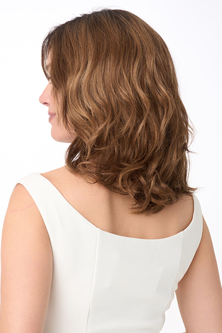 Amanda by Envy synthetic lace front wig in Cinnamon Toffee with wavy, shoulder-length hair and a mono top.