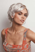 Asha synthetic pixie wig in platinum blonde with a lace front, side-swept fringe, and textured layers.