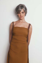 Asha synthetic pixie wig in grey with a lace front, side-swept fringe, and textured layers on a model.