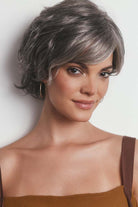 Asha synthetic pixie wig in grey with a lace front, side-swept fringe, and textured layers.