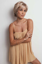 Asha synthetic lace front pixie wig in a highlighted blonde shade with textured layers and side-swept fringe.