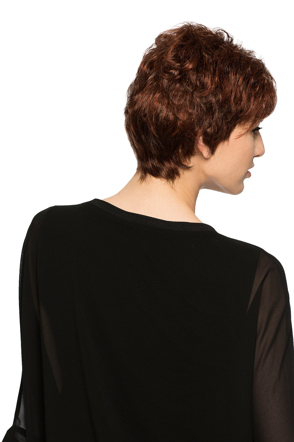 Woman wearing Aubrie synthetic pixie wig by WigPro in color 32/130 wearing a black top against a white background - back view