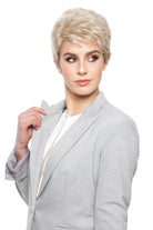 Woman wearing Aubrie synthetic pixie wig by WigPro in color SF23-20-27 wearing a black top against a white background - front view