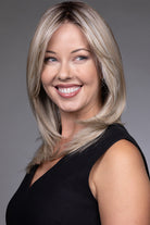 Mid-length blonde layered synthetic wig with a natural lace front and monofilament top.