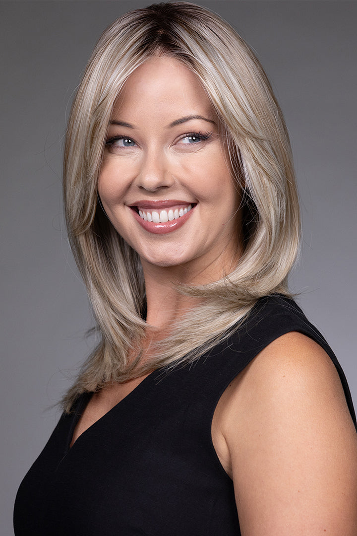 Mid-length blonde layered synthetic wig with a natural lace front and monofilament top.
