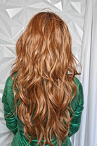 Woman with long wavy red wig (Gaia by Auburn Spice R) back