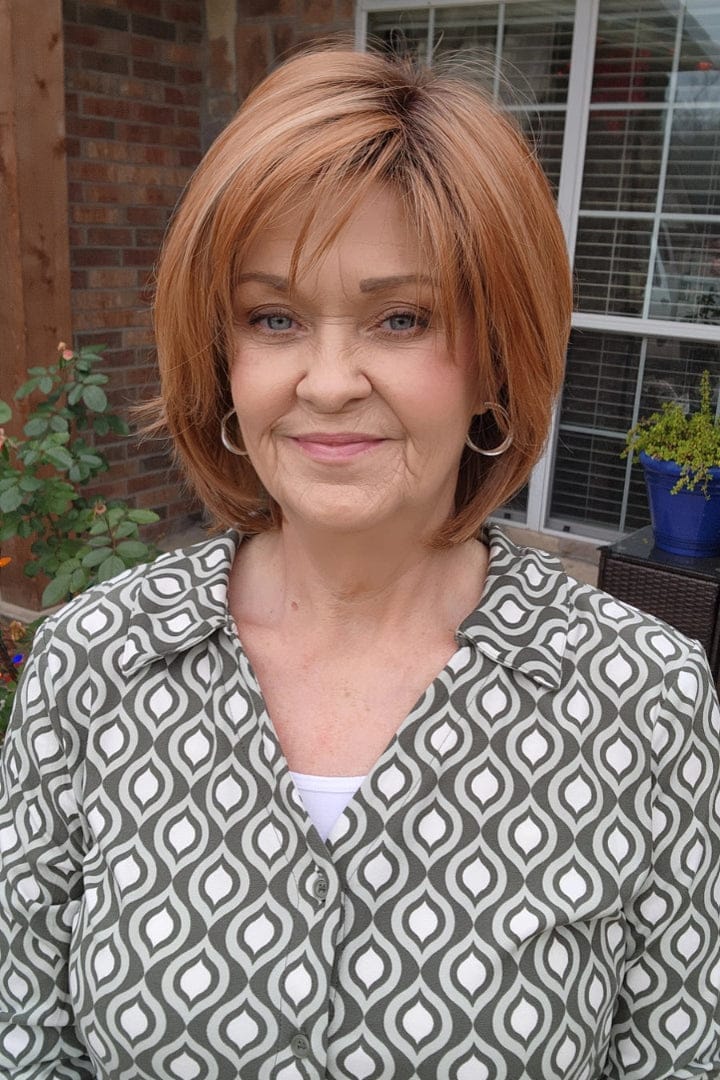 BelleTress Wintour wig in Mixed Berry, woman wearing it