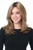 Bobbi by Envy long layered synthetic lace front wig in light brown with dark roots.