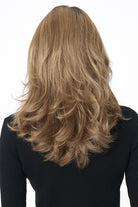 Bobbi by Envy long layered synthetic wig in a warm blonde shade, viewed from the back.