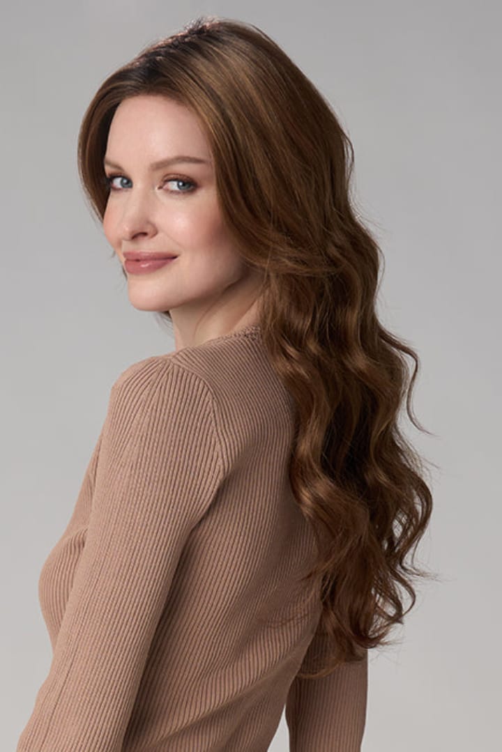Woman wearing Brianna Hand Tied Wig by Envy in Cinnamon Toffee | Left Side