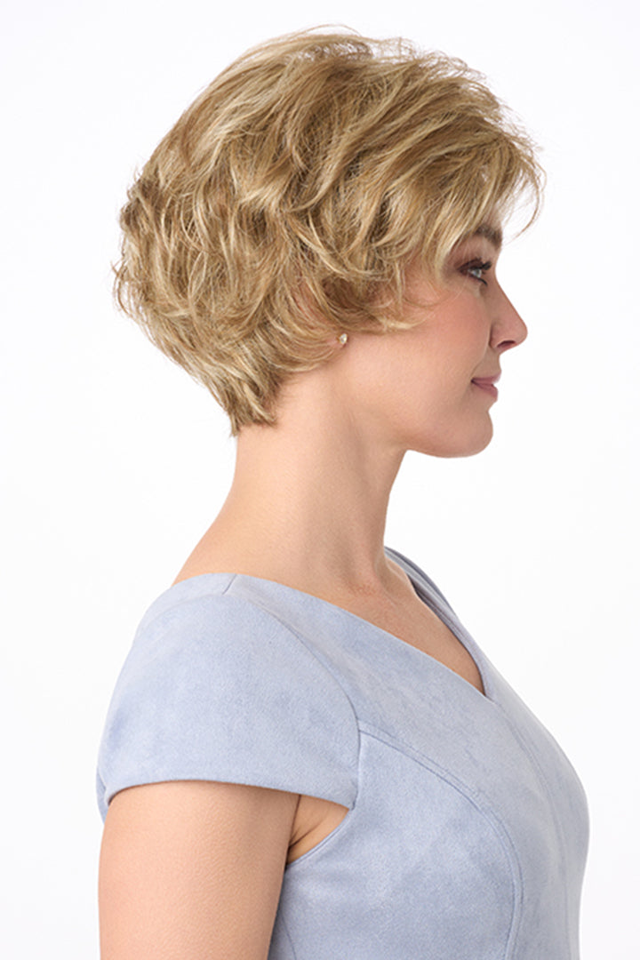 Bryn by Envy short, voluminous, curly blonde synthetic wig with an extended nape.