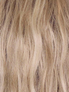 Buttercream Blond-R | The rooted sister of Buttercream Blond, this baby blonde features a warm chocolate root and a radiant blend of ash, honey, and pale gold tones for a soft, sophisticated finish.
