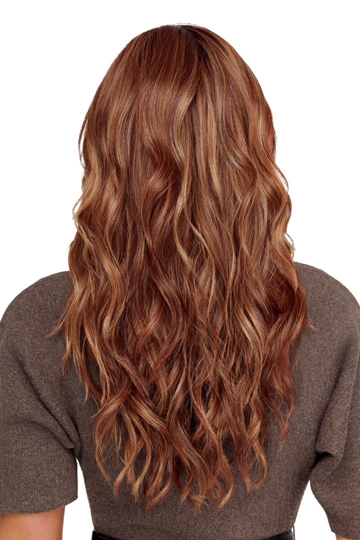 Back view of Cali Girl synthetic wig featuring long, layered, auburn-toned beachy waves with natural highlights.