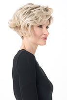 Carrisa by Envy short blonde curly synthetic wig with a lace front and monofilament part.