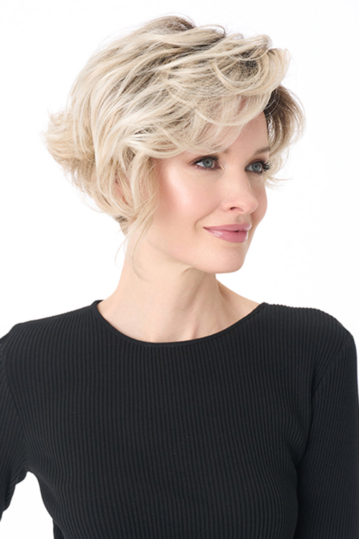 Carrisa by Envy synthetic blonde curly wig with a lace front and tousled, layered volume.