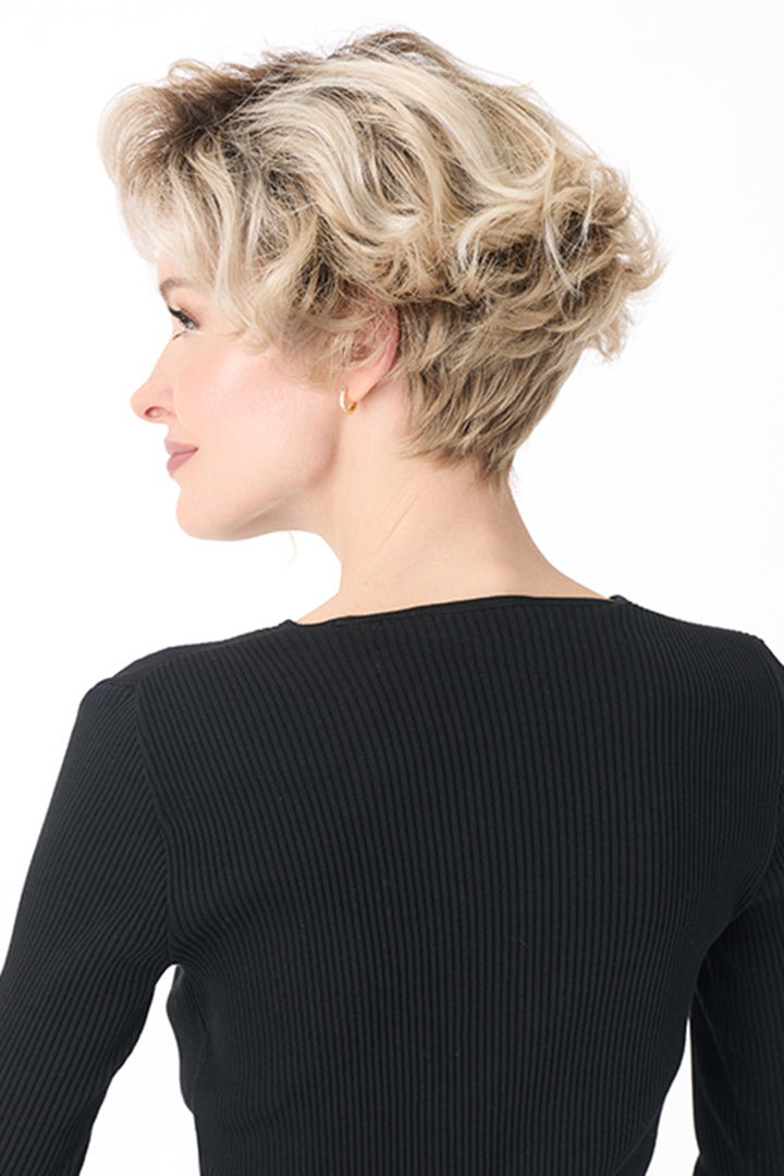 Carrisa by Envy short blonde curly synthetic wig with a natural lace front and tousled layered volume.