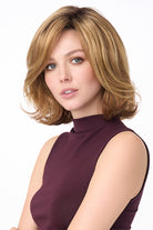 Chloe by Envy synthetic wavy layered bob wig in a light brown shade with a natural lace front and monofilament part.