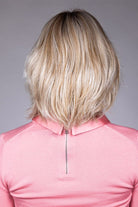Woman is wearing Emilia wig by Belle Tress in Butterbeer R | Back
