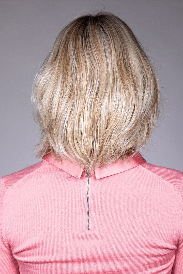 Woman is wearing Emilia wig by Belle Tress in Butterbeer R | Back