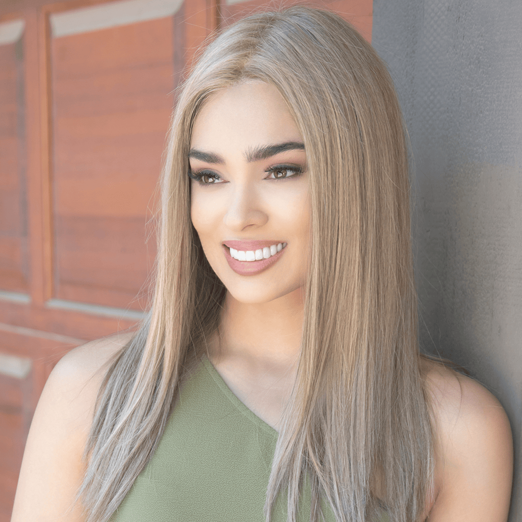 Smiling woman with long blonde hair