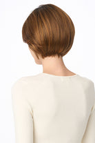 Back view of the Eve by Envy synthetic short brown bob wig with a sleek, polished silhouette.