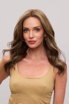 Fiona Lite heat-friendly synthetic wig with long, flowing brown waves and a natural SmartLace front.