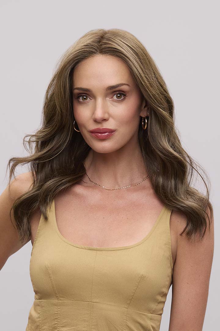Fiona Lite heat-friendly synthetic wig with long, flowing brown waves and a natural SmartLace front.