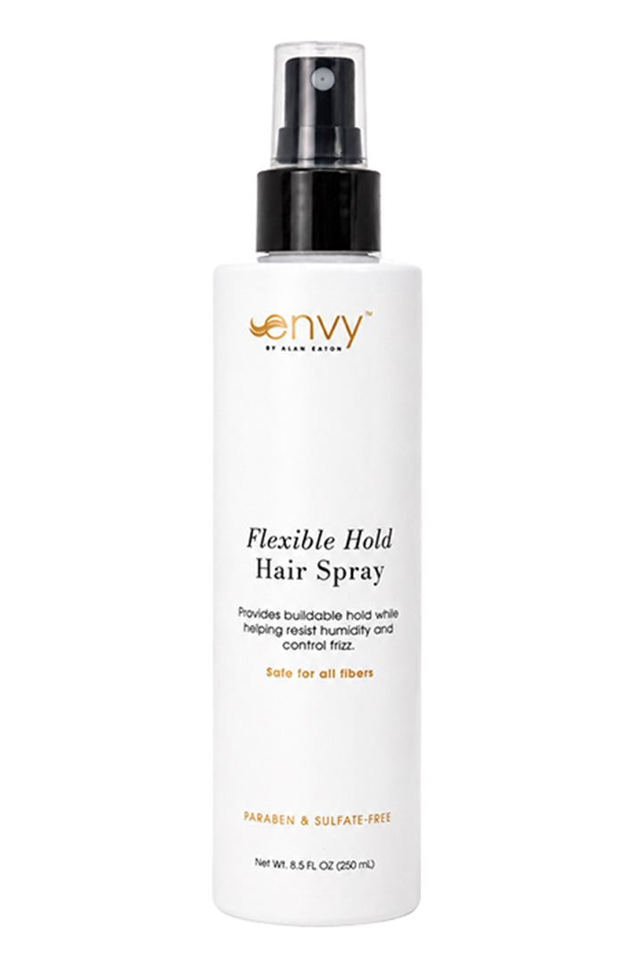 Envy Flexible Hold Hair Spray in a white 8.5 oz bottle with a black spray nozzle and minimalist branding.