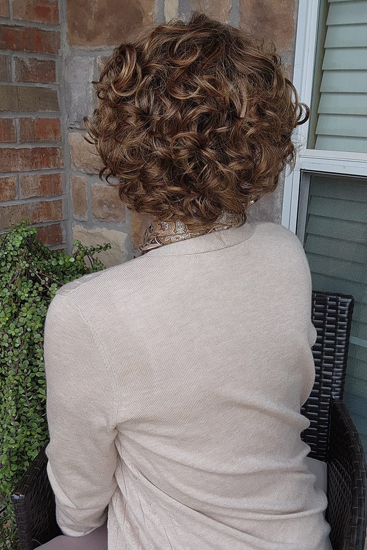 Woman wearing short brunette bob wig (Gabor's Buoyant in color SS Hazelnut) back