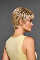 Boss Energy by Gabor short blonde layered pixie wig with a natural lace front shown from a side profile view.
