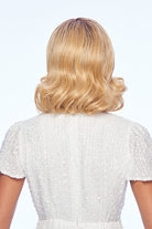 Woman wearing Exhilaration wig by Gabor in  SS Medium Blonde | Back