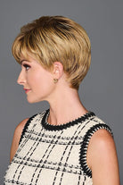 Woman wearing Graceful Touch wig by Gabor in SS Medium Blonde | Left Side