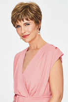 Woman wearing Optimistic wig by Gabor in Brown Blonde | Front looking to side