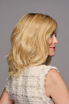 Woman wearing Waver wig by Gabor in SS Medium Blonde | Right Side