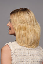 Woman wearing Waver wig by Gabor in SS Medium Blonde | Left Side