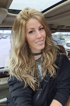 Woman wearing long blonde layered wig (Sweetly Subtle by Gabor in color  Honey Pecan)